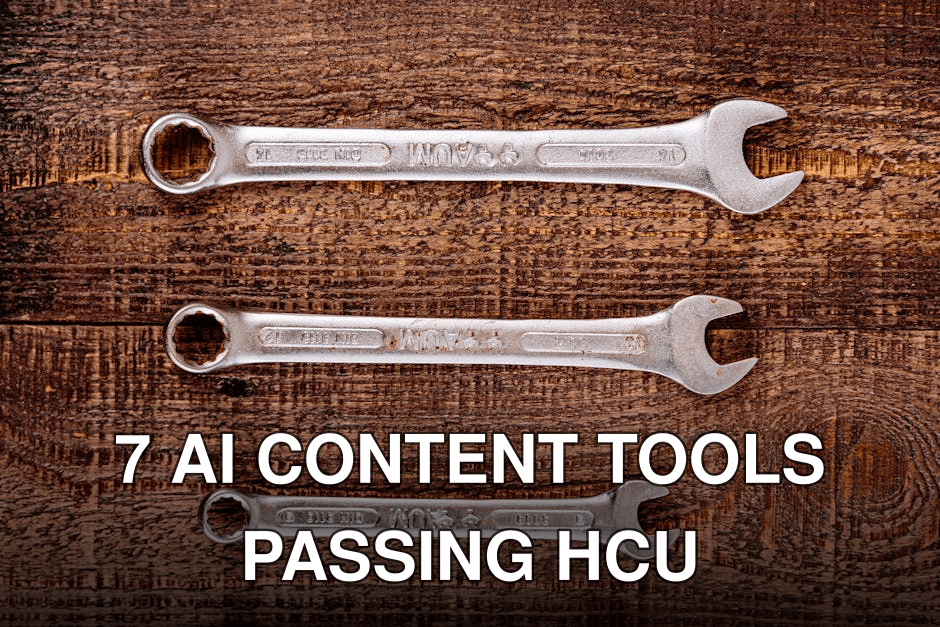 Three metallic wrenches arranged on a rustic wooden table, top view.