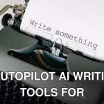 A close-up of a vintage typewriter with 'Write something' typed on paper.