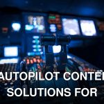 Close-up of a commercial aircraft cockpit with illuminated control panels and levers, showcasing aviation technology.
