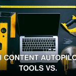 Overhead view of a laptop surrounded by various hand tools on a dark background, representing technology and construction.