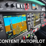 Detailed view of a modern airplane cockpit featuring advanced Garmin navigation displays and controls.