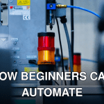 Detailed view of automated machinery with warning signals in an industrial setting.