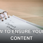 Close-up of a notebook page with 'Content Strategy' written on it, ideal for business planning visuals.