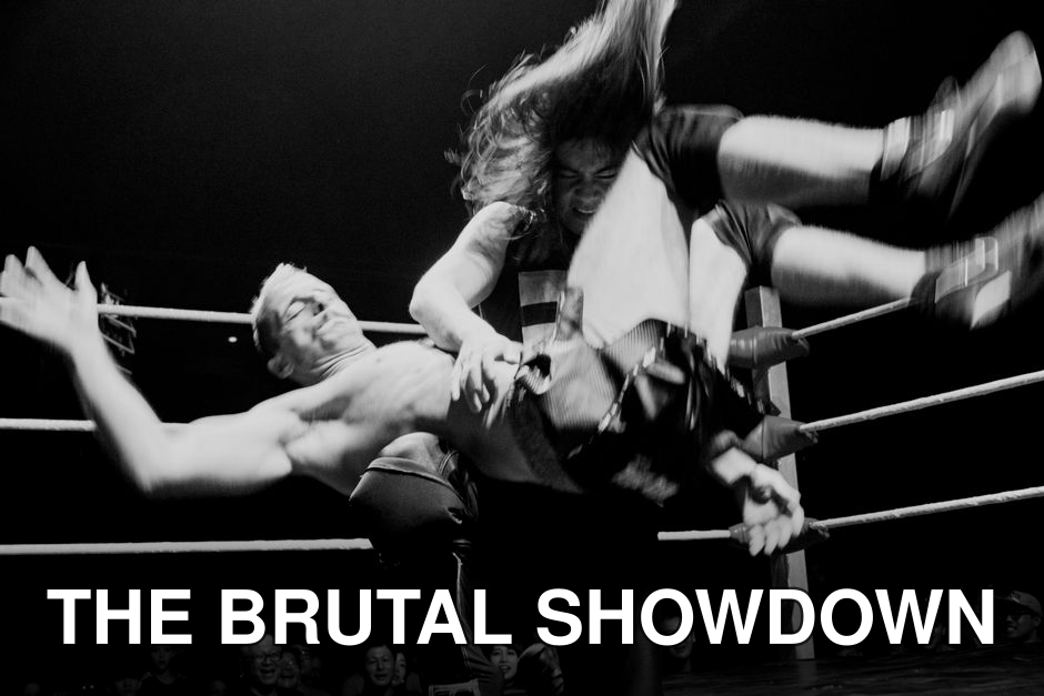 A thrilling moment captured in a wrestling match, showcasing athleticism and energy.