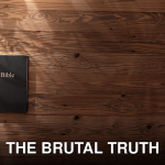 Bible resting on a wooden surface with soft shadows creating a serene atmosphere.
