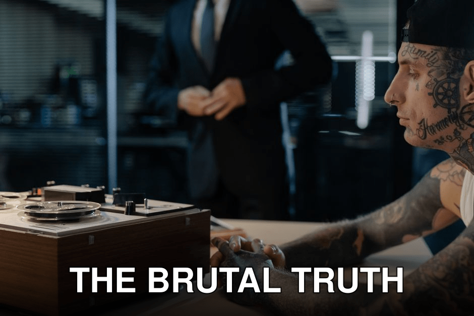 Tattooed man in an investigation room with a vintage recorder, suggesting interrogation or investigation scenario.