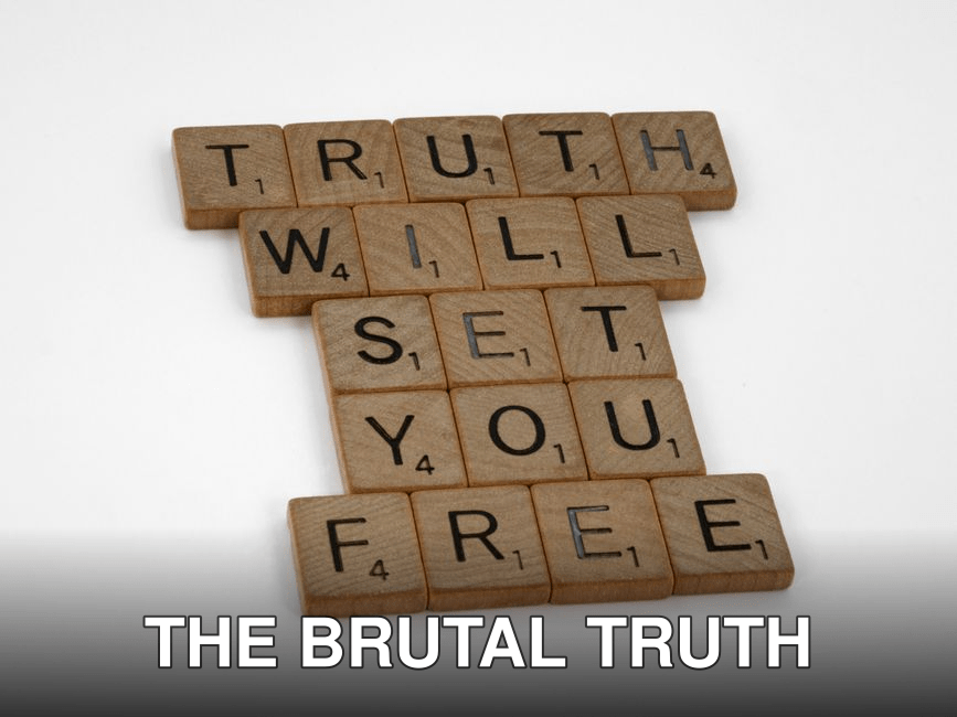 Scrabble tiles forming the phrase 'Truth Will Set You Free' on a white surface.