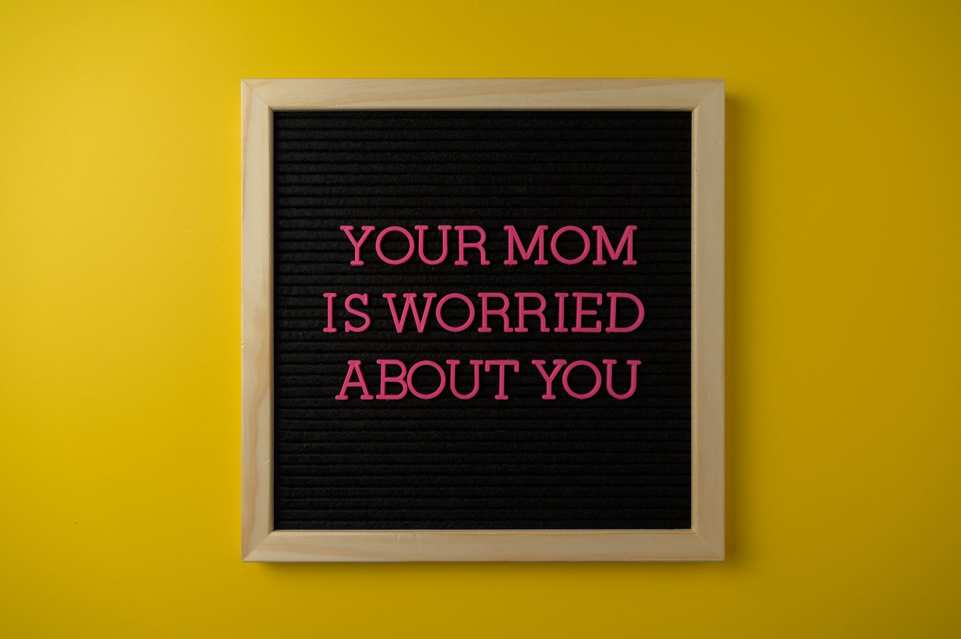 A motivational message board with text on a vibrant yellow background, perfect for inspiration.