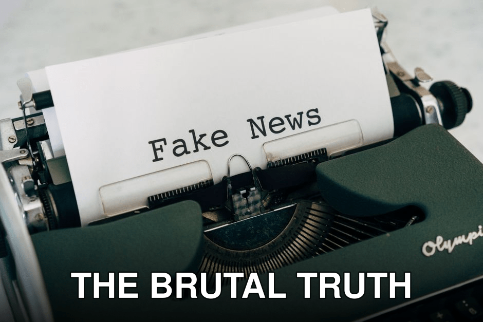 Close-up of vintage typewriter printing 'Fake News', depicting false information concepts.