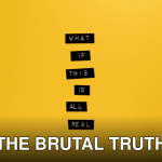 Inspirational text 'What if this is all real' on yellow surface.