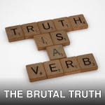Scrabble tiles arranged on a white background spelling 'Truth is a Verb' for creative representation.