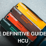 Top view of Pantone color guides showcasing vibrant shades for creative design projects.