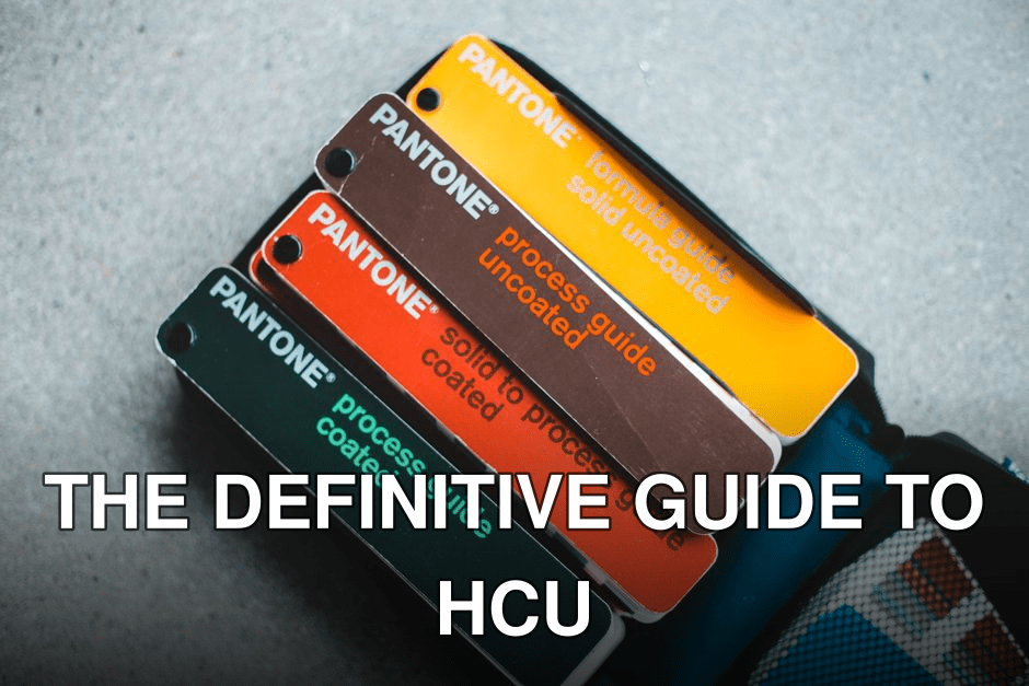 Top view of Pantone color guides showcasing vibrant shades for creative design projects.