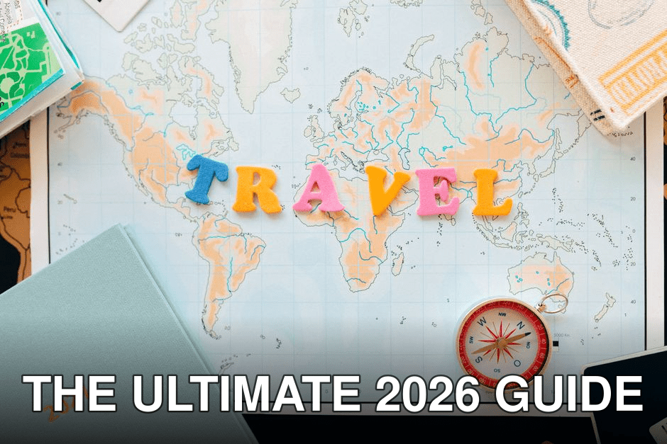 Flat lay of a map with colorful letters "TRAVEL" and a compass for planning adventures.