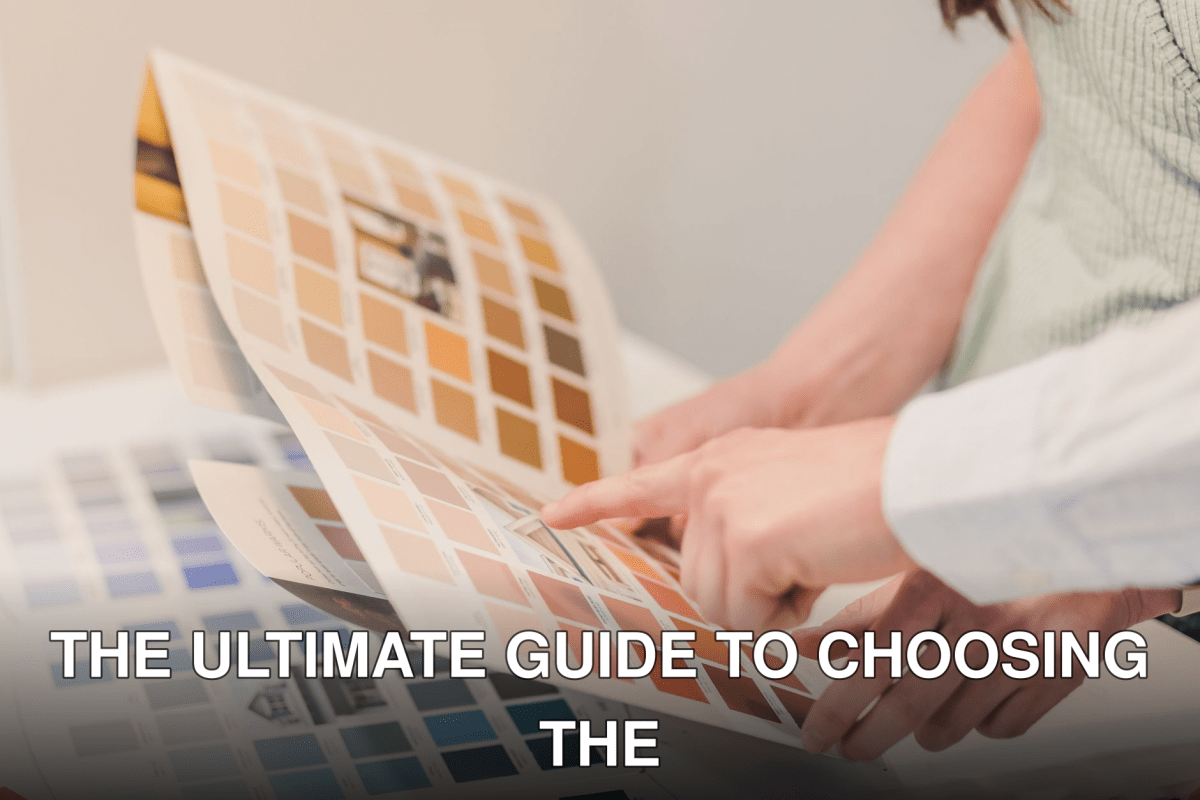 Two people discussing and choosing color palettes for interior design projects.