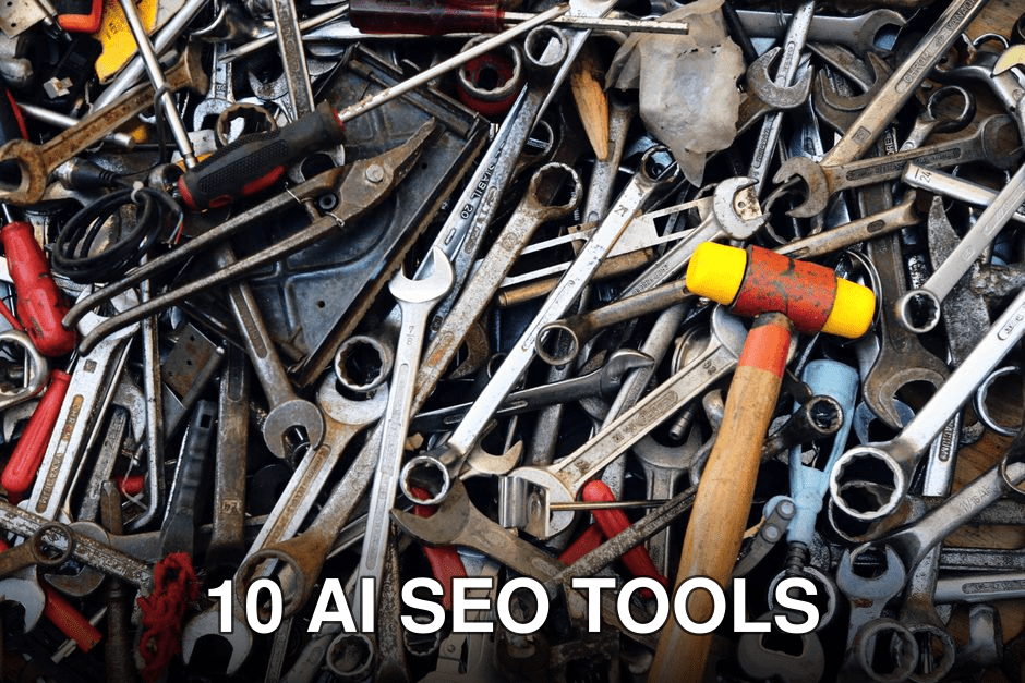 Close-up view of various tools including wrenches and a hammer, providing a cluttered yet organized look.