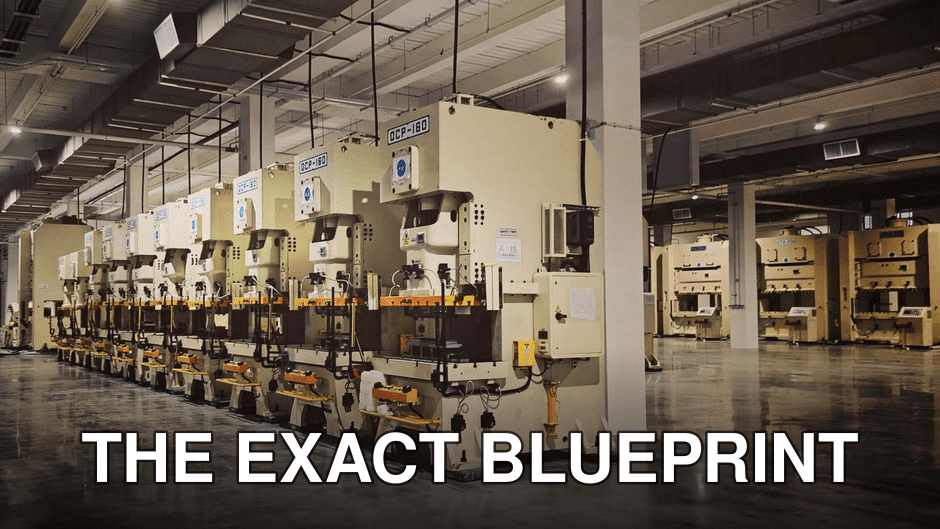 A row of industrial machines on a factory floor, highlighting manufacturing equipment.