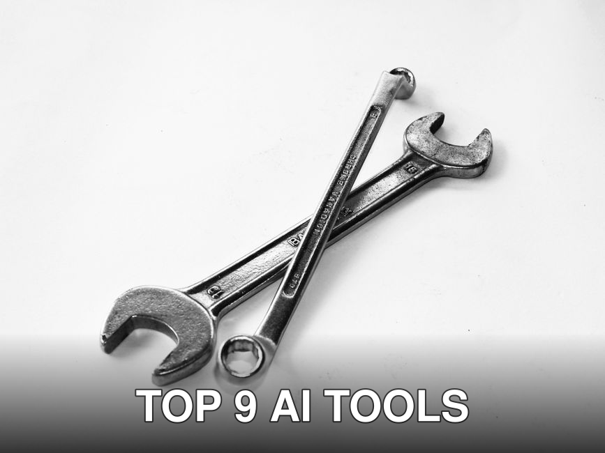 A pair of crossed metal wrenches on a clean white surface.